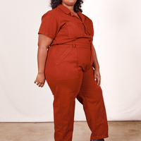 Angled view of Short Sleeve Jumpsuit in Paprika worn by Morgan