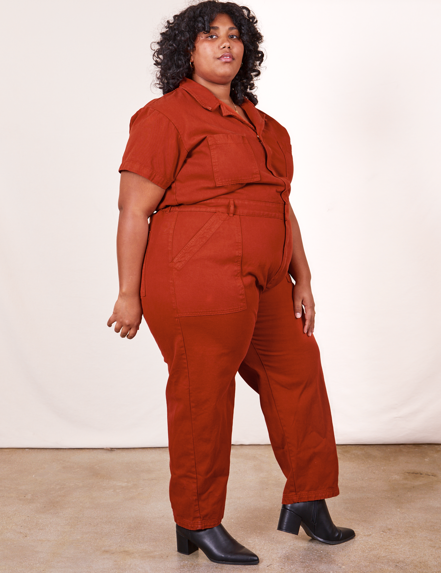 Angled view of Short Sleeve Jumpsuit in Paprika worn by Morgan