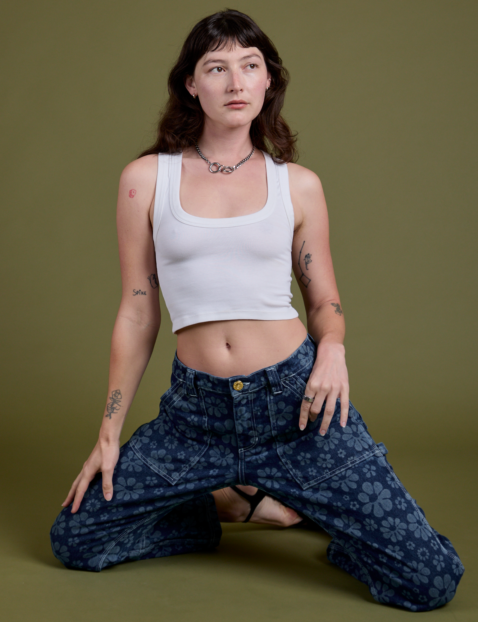 Lazy Daisy Mid-Rise Carpenter Jeans and vintage tee white Cropped Tank worn by Alex
