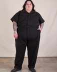 Sam is 5'10" and wearing 4XL Long Jumpsuit in Basic Black