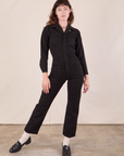 Alex is wearing Long Sleeve Jumpsuit in Basic Black