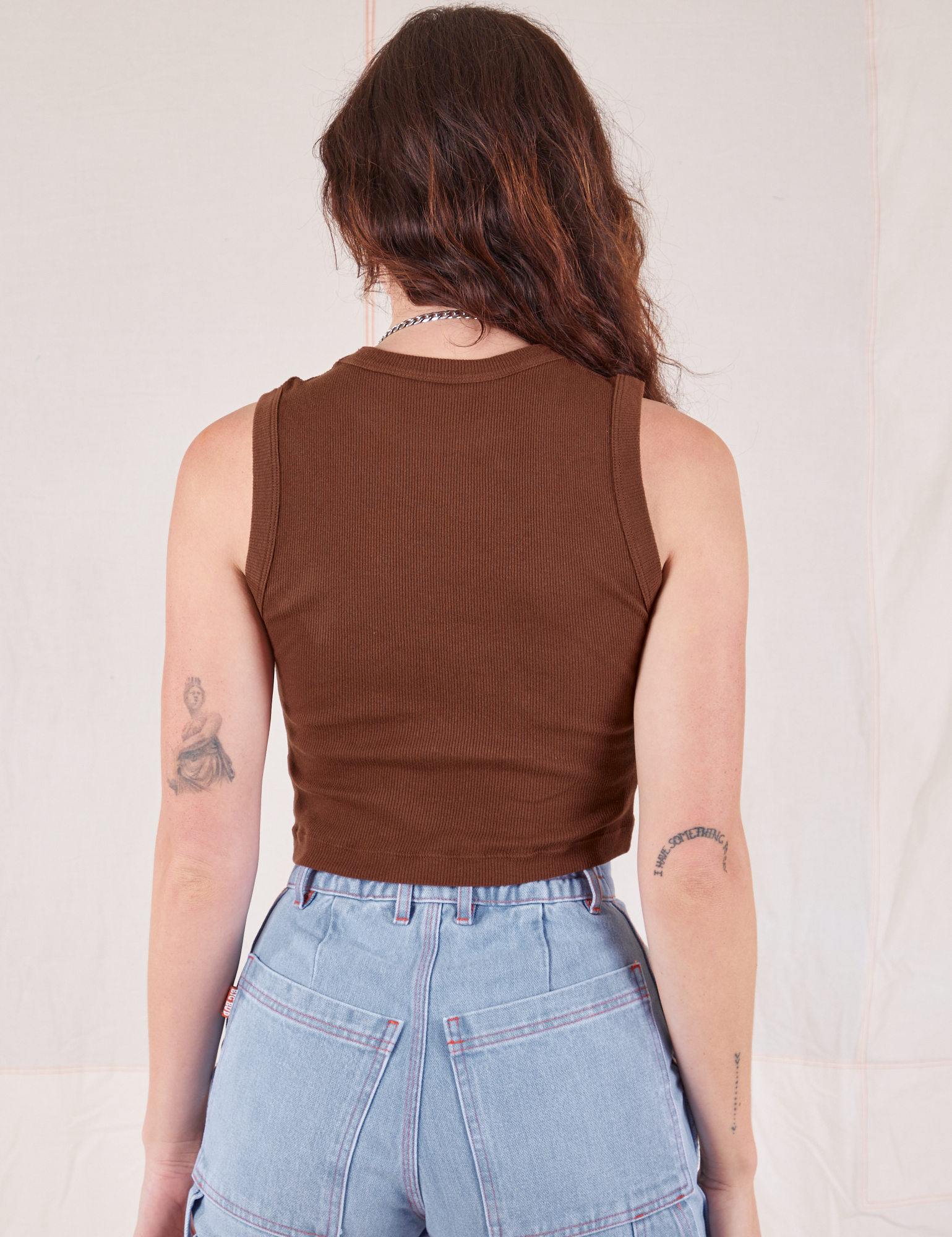 Muscle Tee in Fudgesicle Brown back view on Alex