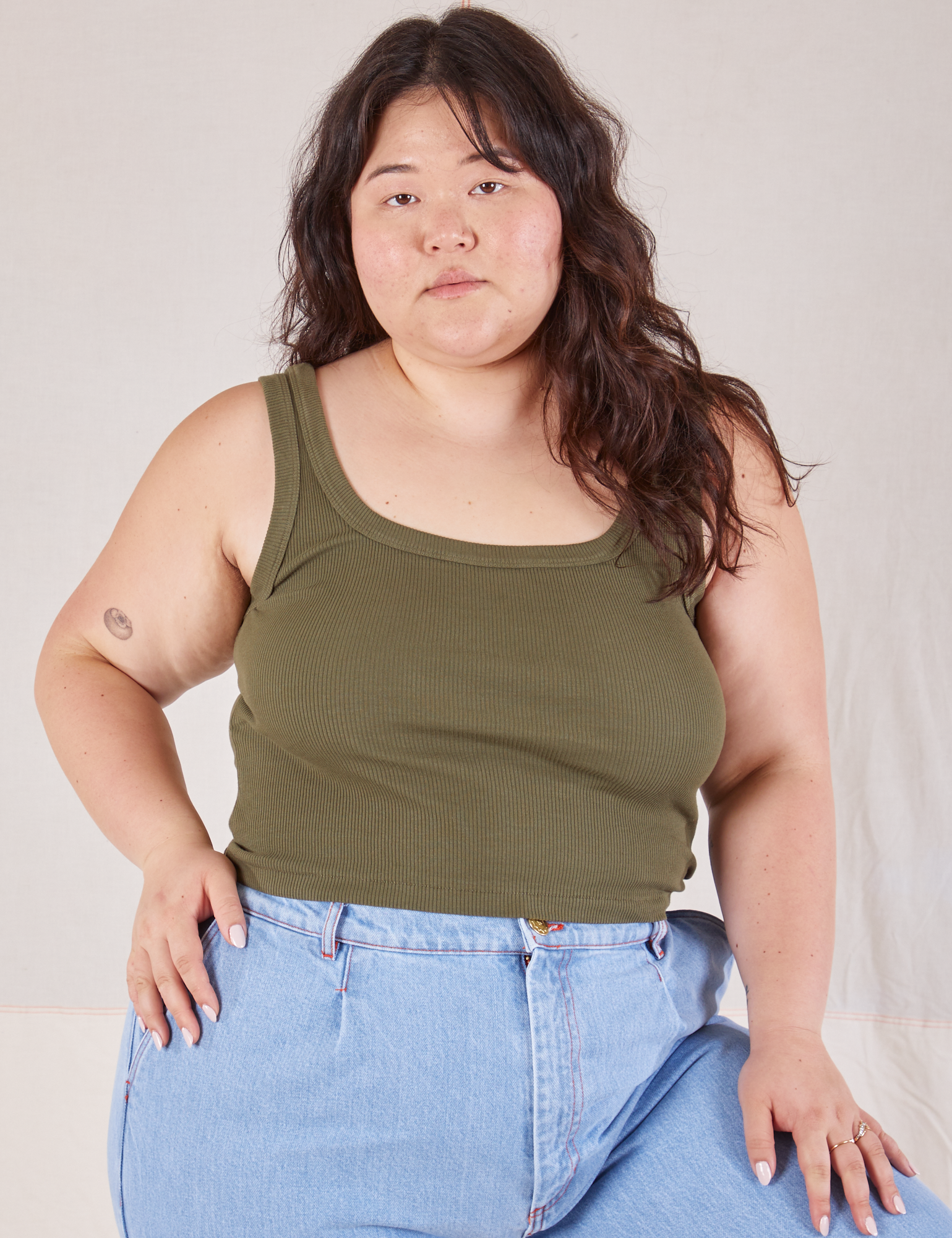 Ashley is 5’7” and wearing XL Square Neck Tank in Surplus Green