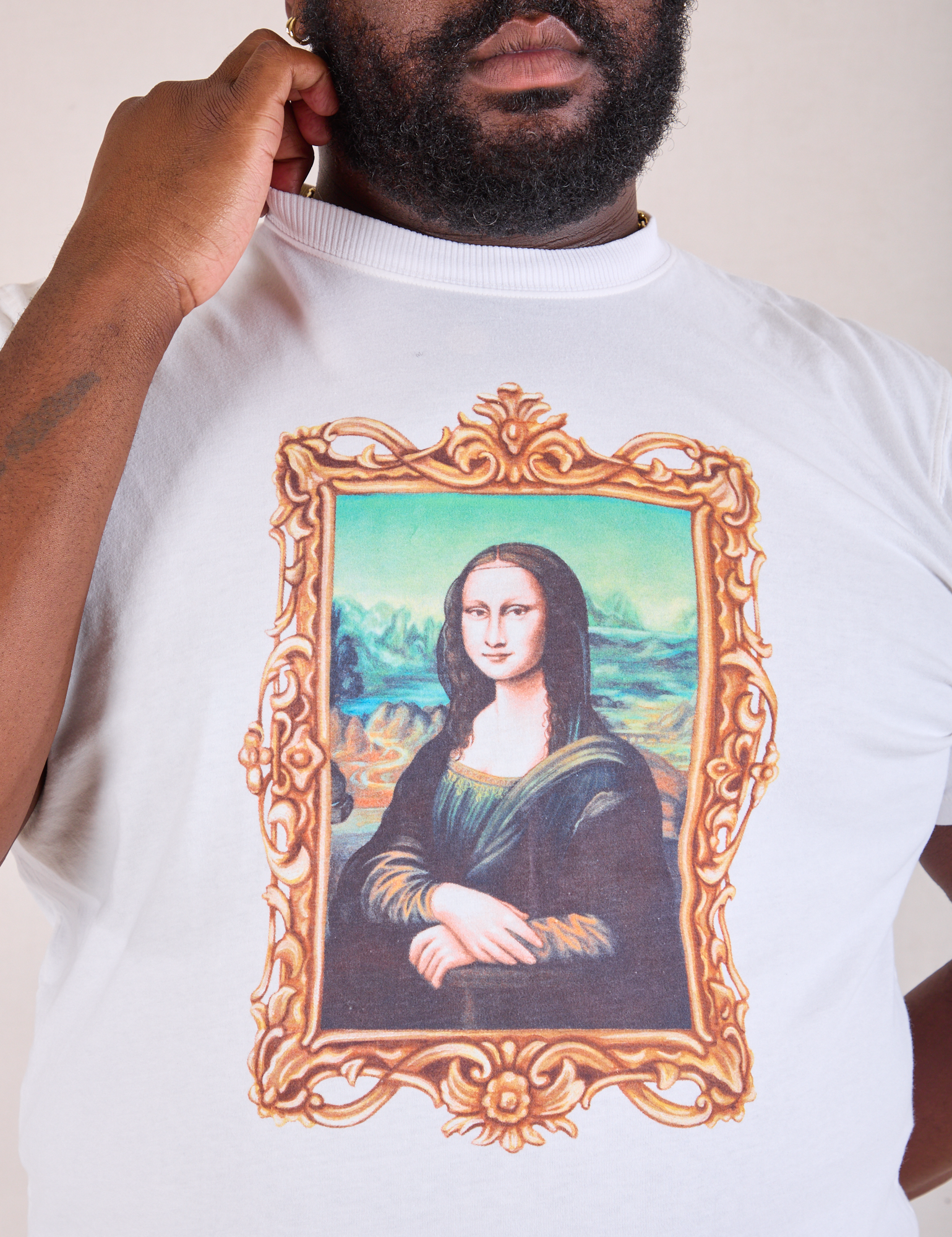 Masters Organic Tee in Mona Lisa front close up on Elijah