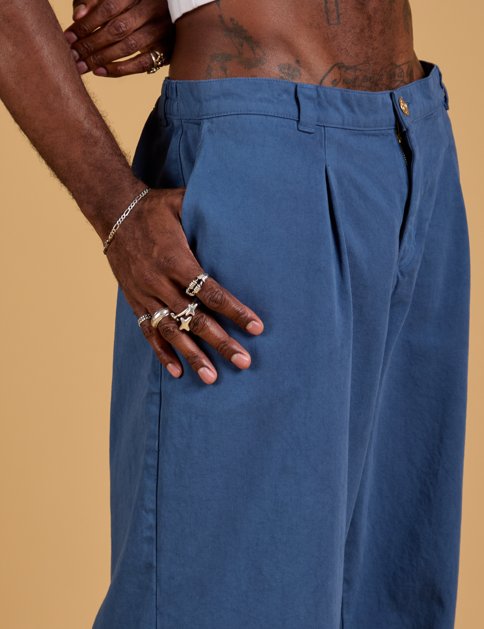 Side view close up of Baggy Mid-Rise Trousers in French Blue on Jerrod