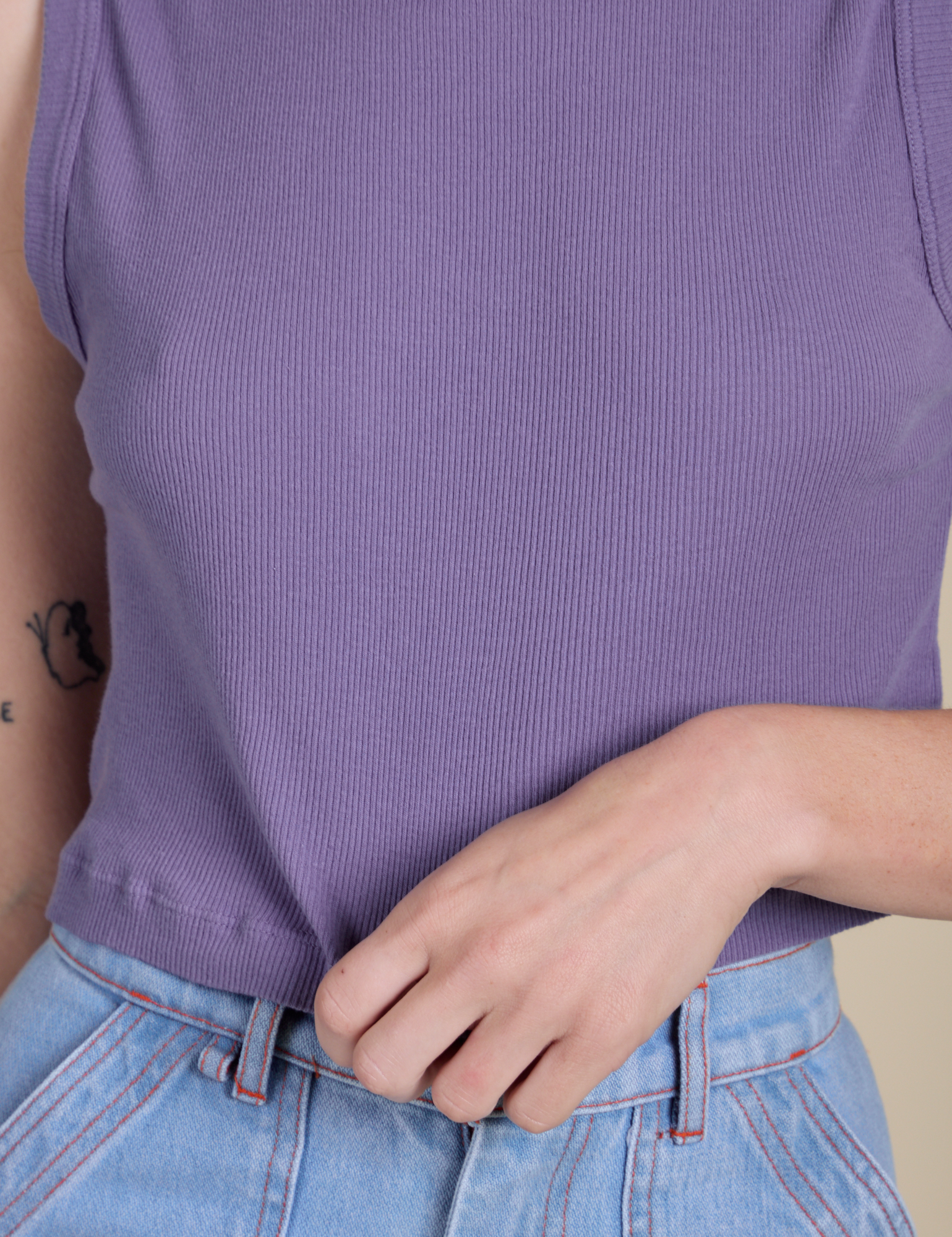 Close up of Muscle Tee in Faded Grape on Alex