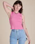Alex is wearing Muscle Tee in Bubblegum Pink
