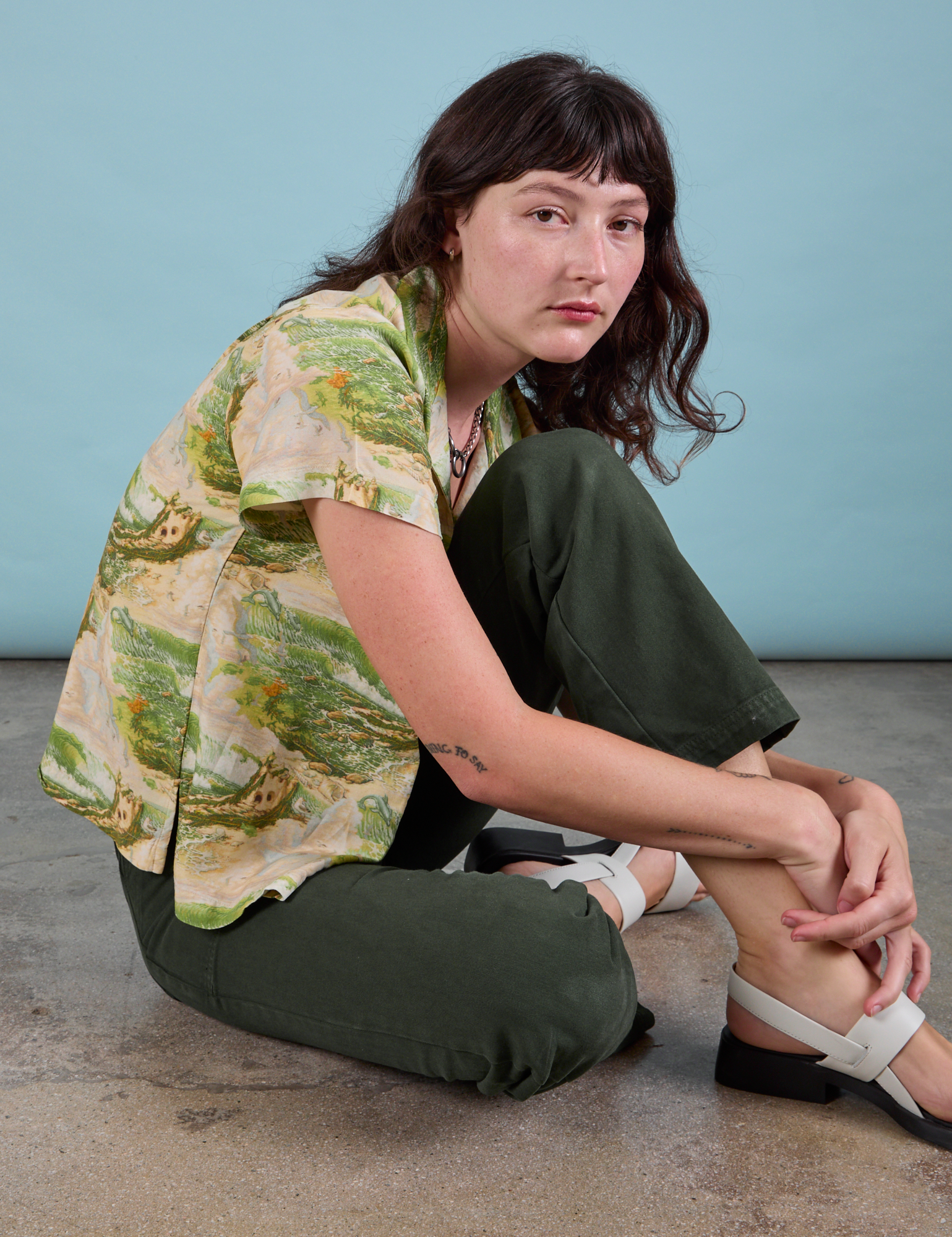Alex is wearing Pantry Button-Up in Ocean and Sky