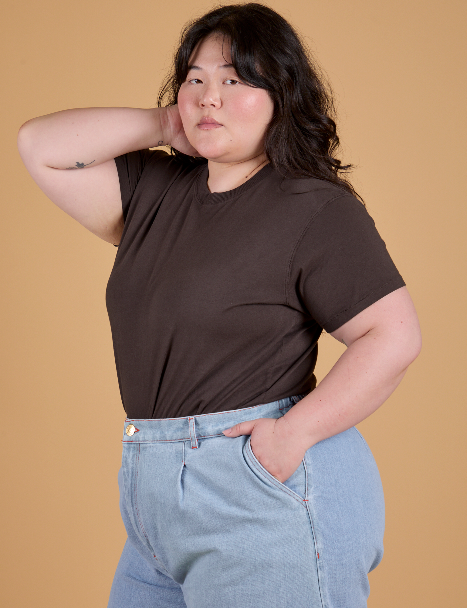 Angled front view of Organic Vintage Tee in Espresso Brown on Ashley