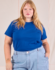 Juliet is wearing Organic Vintage Tee in Royal Blue tucked into light wash Carpenter Jeans