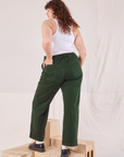 Organic Work Pants in Swamp Green back view on Ryan