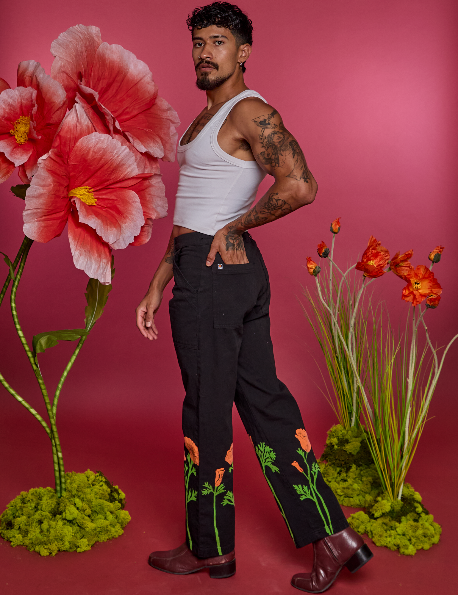 Side view of Paintstamped Work Pants in Poppy and Cropped Tank in Vintage Tee White on Jesse