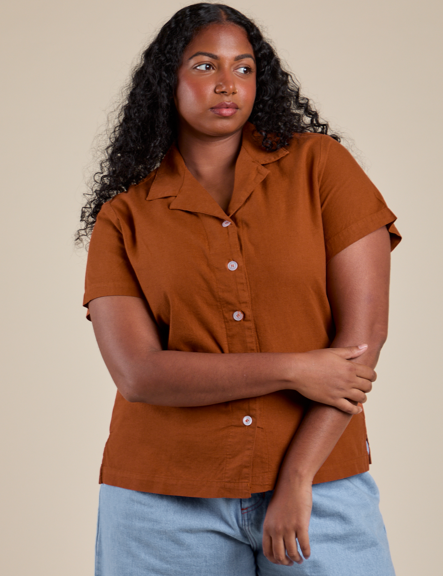Meghna is 5’8” and wearing M Pantry Button-Up in Burnt Terracotta