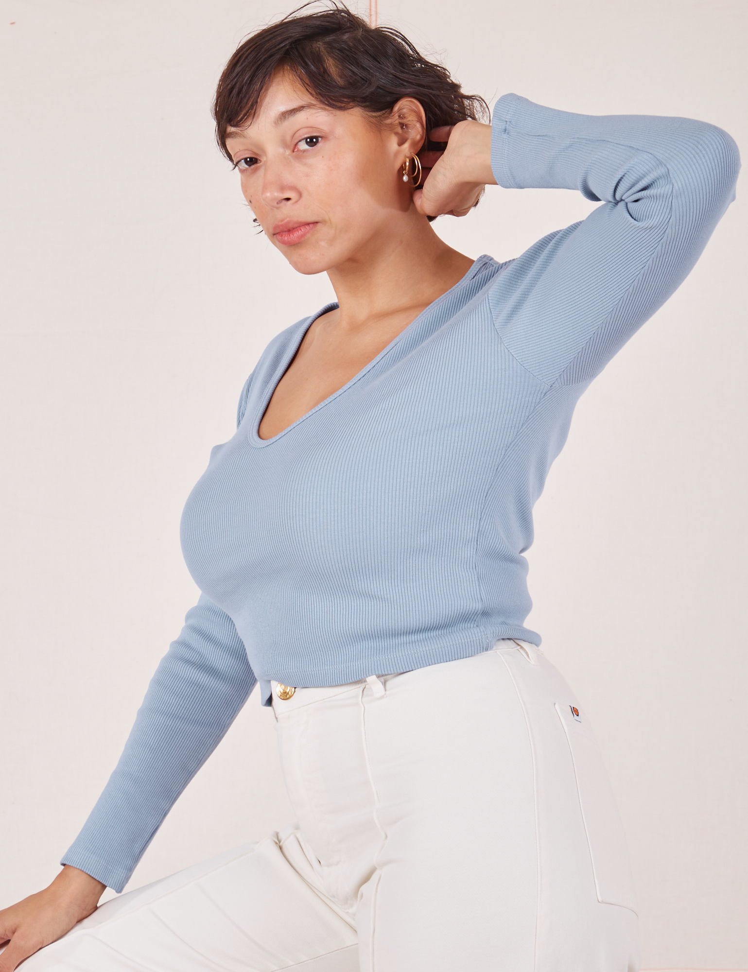 Angled front view of Long Sleeve V-Neck Tee in Periwinkle on Tiara