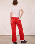 Back view of Work Pants in Mustang Red and Burly Tee in Vintage Tee Off-White