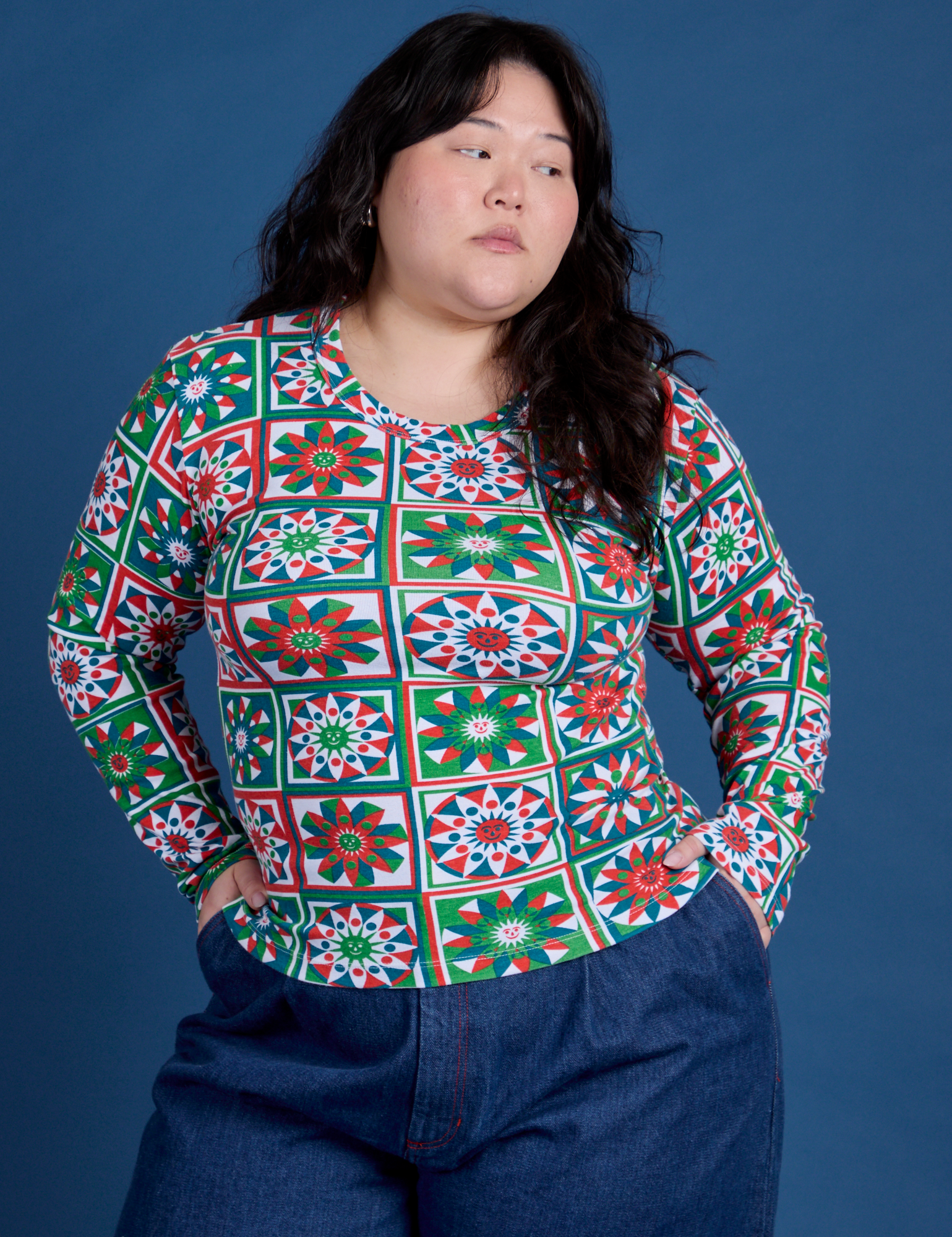 Ashley is 5’7” and wearing L Long Sleeve Baby Tee in Quilt Print