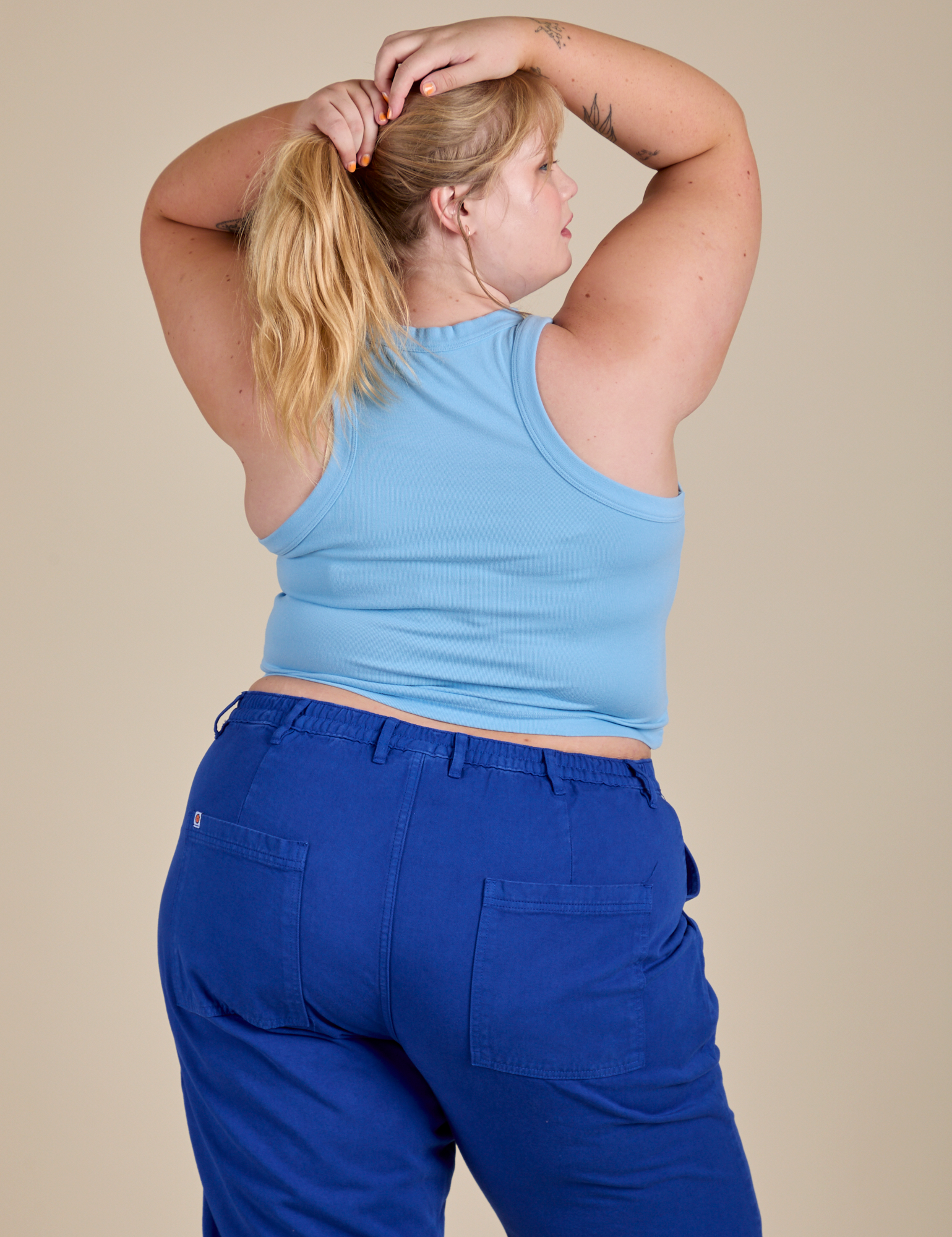 Racerback Tank in Baby Blue back view on Juliet