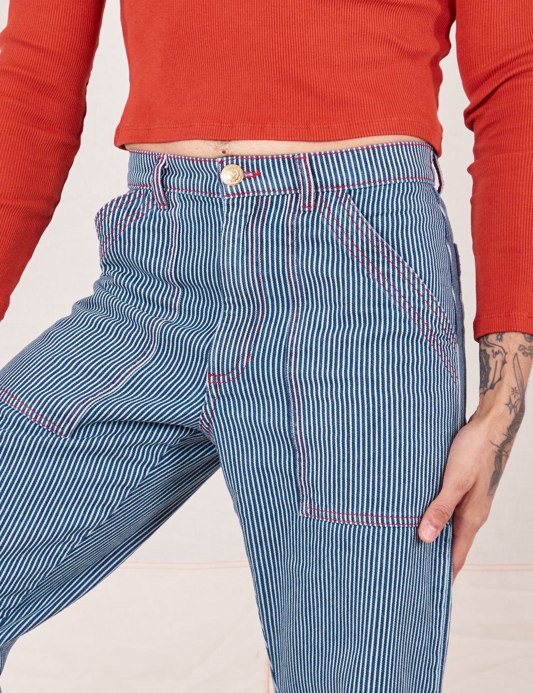 Front close up of Railroad Stripe Denim Work Pants worn by Jesse