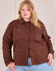 Juliet is wearing a buttoned up Ripstop Work Jacket in Fudgesicle Brown