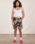 Jesse is 5'8" and wearing XS Sweat Shorts in Rainbow Magic Waters paired with vintage off-white Cami