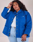 Morgan is 5'5" and wearing 1XL Denim Work Jacket in Royal Blue