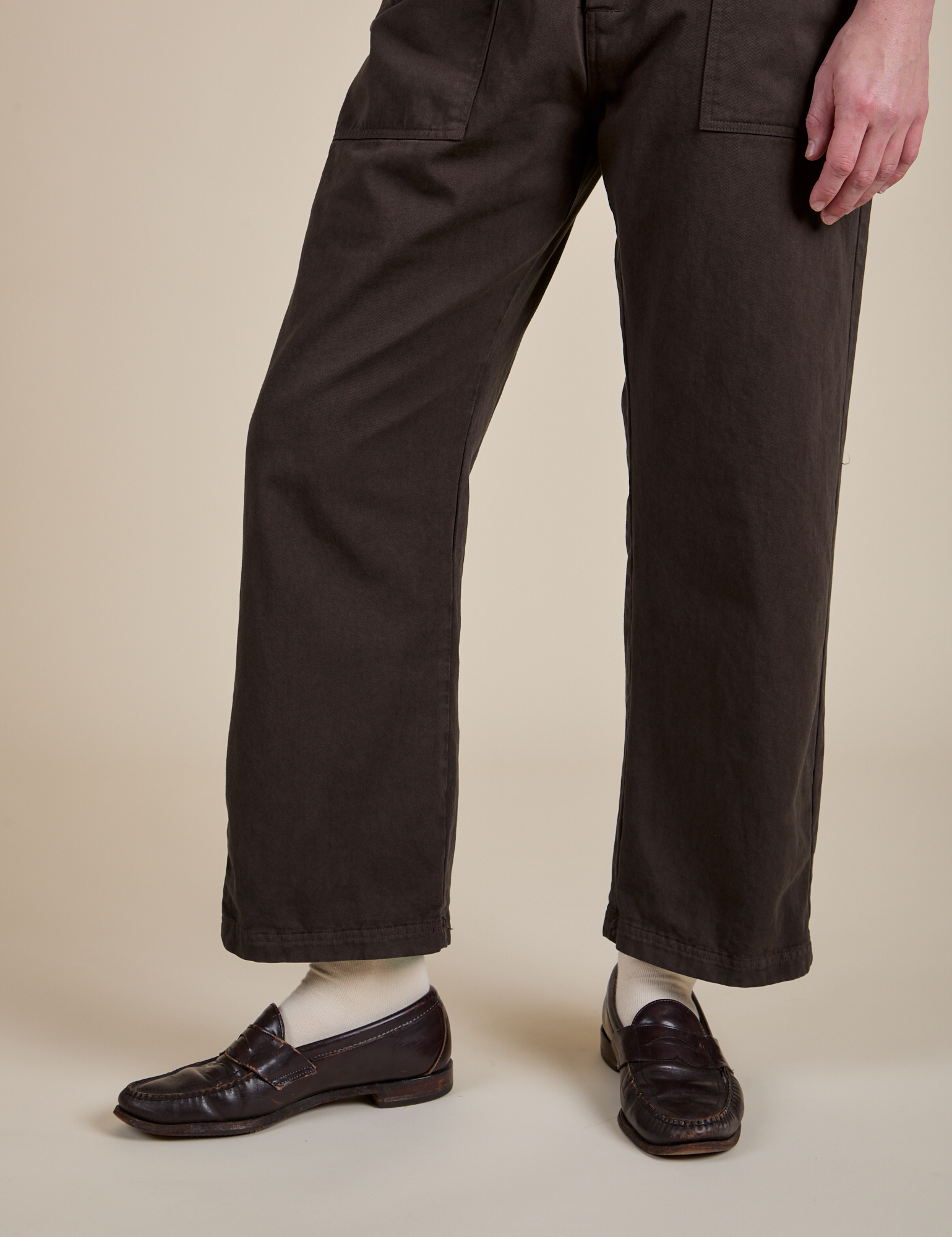 Short Sleeve Jumpsuit in Espresso Brown pant leg close up on Quinn