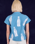 Soda Bottle Pantry Button-Up in Greek Blue back view on Madeline