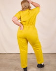 Short Sleeve Jumpsuit in Golden Yellow back view on Juliet