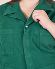 Front close up of Short Sleeve Jumpsuit in Hunter Green worn by Marielena