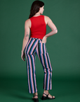 Back view of Work Pants in Pacific Stripe and mustang red Tank Top on Alex