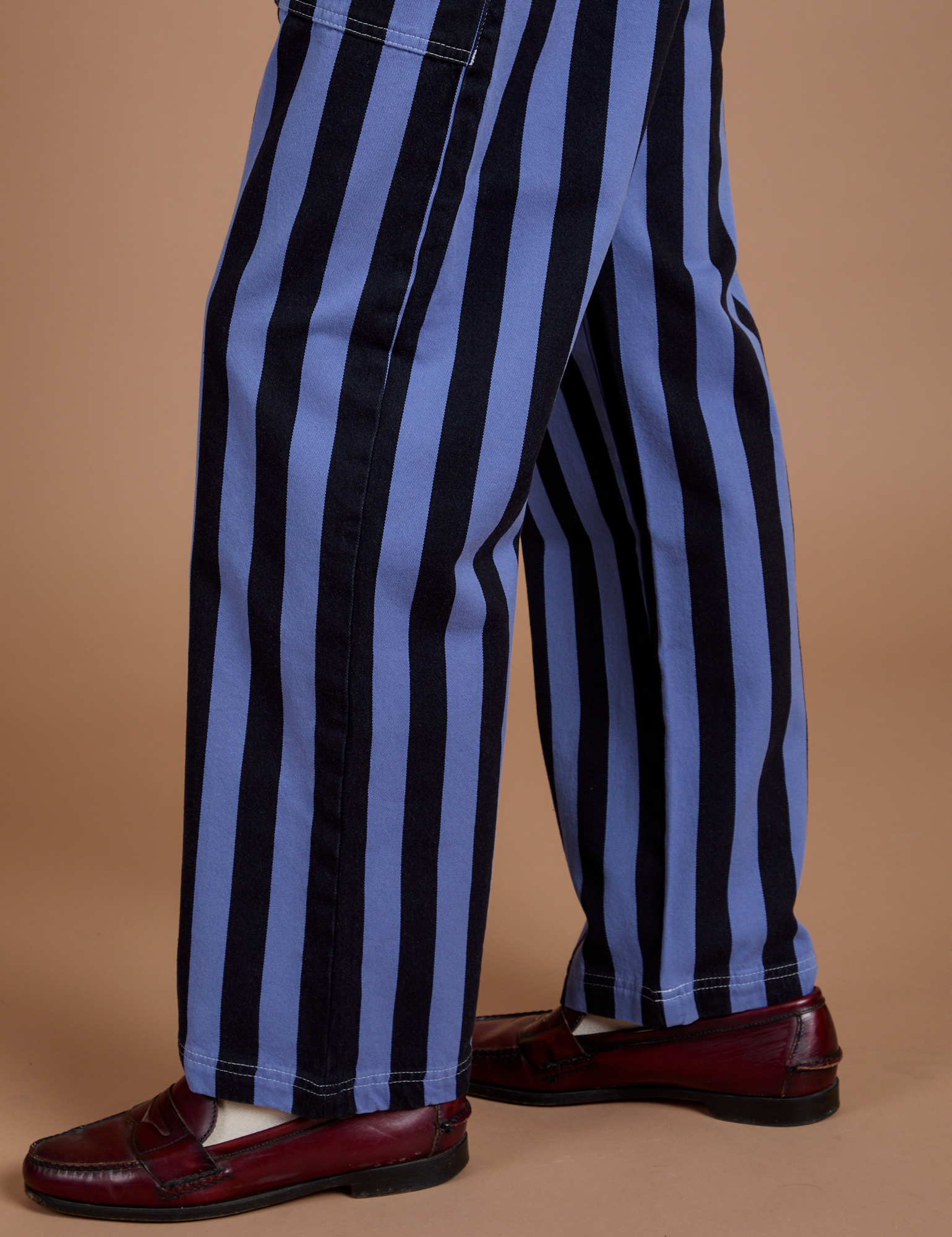 Pant leg side view close up of Black Stripe Work Pants in Cornflower Blue on Anthony