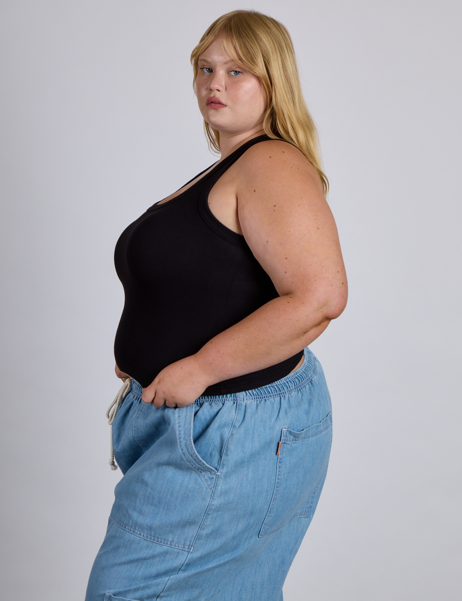 Side view of The Tank Top in Basic Black on Juliet