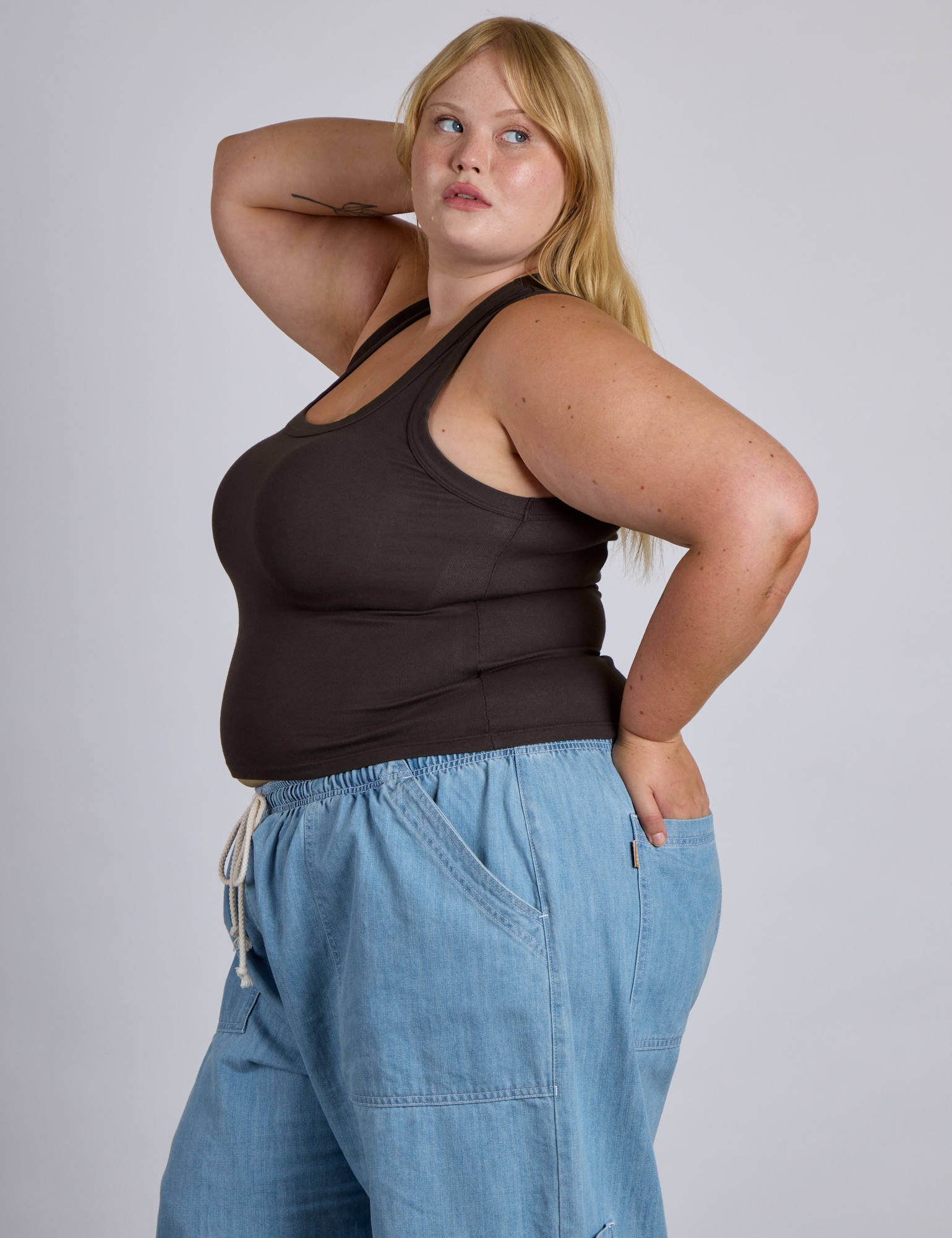 Side view of The Tank Top in Espresso Brown on Juliet
