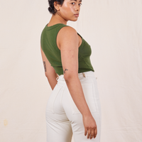 Tank Top in Dark Emerald Green back view on Mika wearing vintage off-white Western Pants