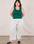 Ashley is wearing Tank Top in Hunter Green and vintage tee off-white Petite Western Pants