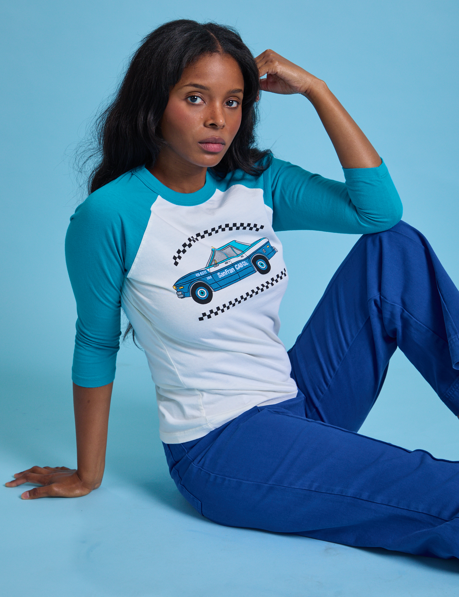 Kandia is wearing Taxi Raglan Tee in San Francisco