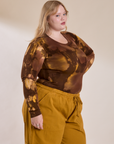 Long Sleeve Baby Tee in Honey Brown angled front view on Juliet