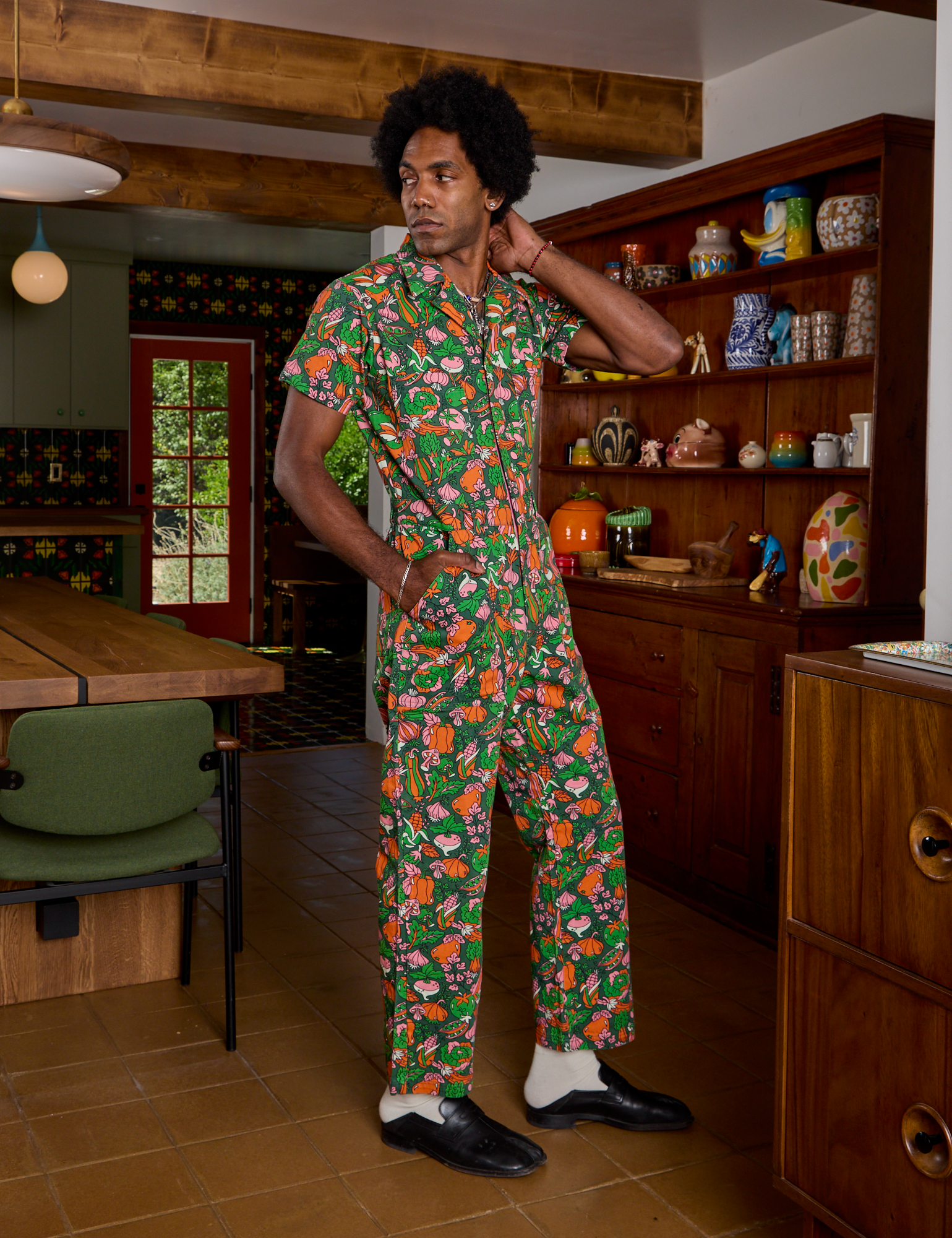 Angled front view of Short Sleeve Jumpsuit in Kitchen Collection on Jerrod