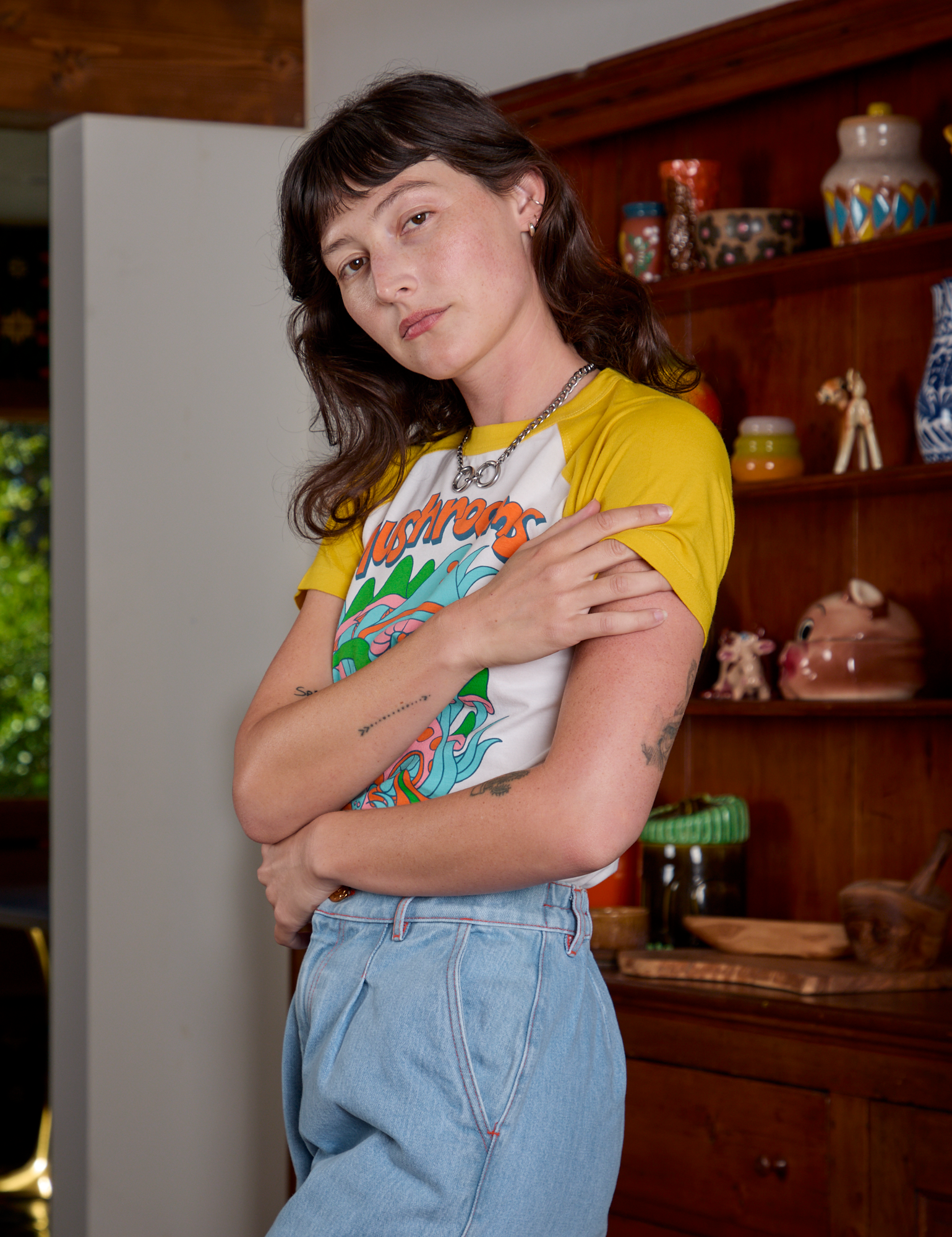 Short Sleeve Raglan Tee in Mushrooms angled front view on Alex