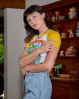 Short Sleeve Raglan Tee in Mushrooms angled front view on Alex