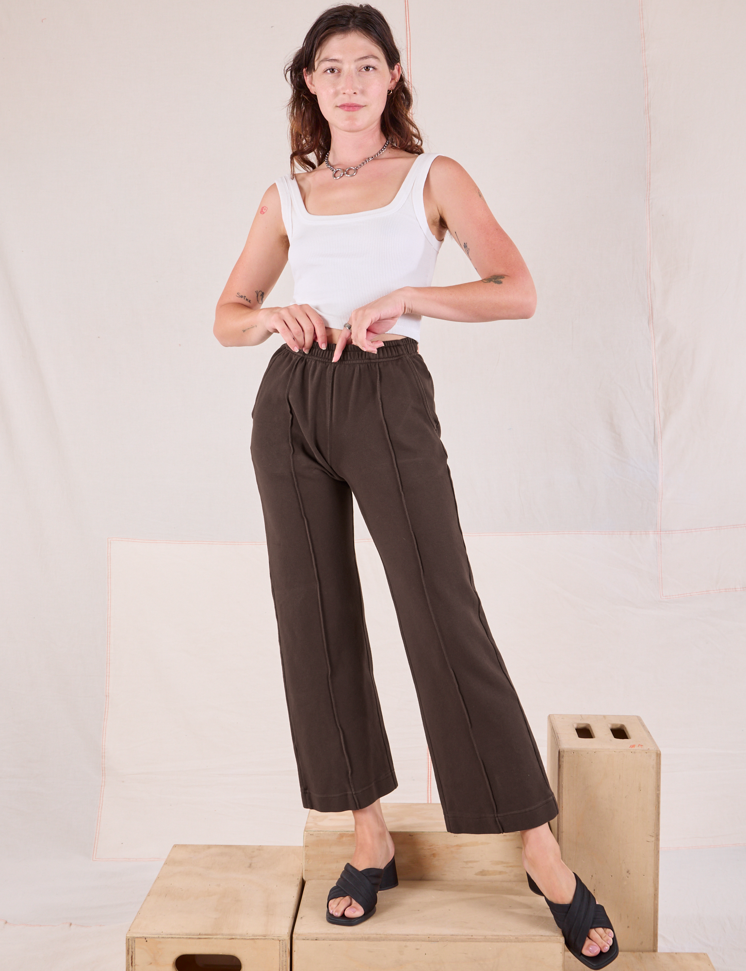 Alex is 5&#39;8&quot; and wearing P Easy Western Pants in Espresso Brown