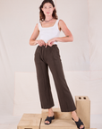 Alex is 5'8" and wearing P Easy Western Pants in Espresso Brown