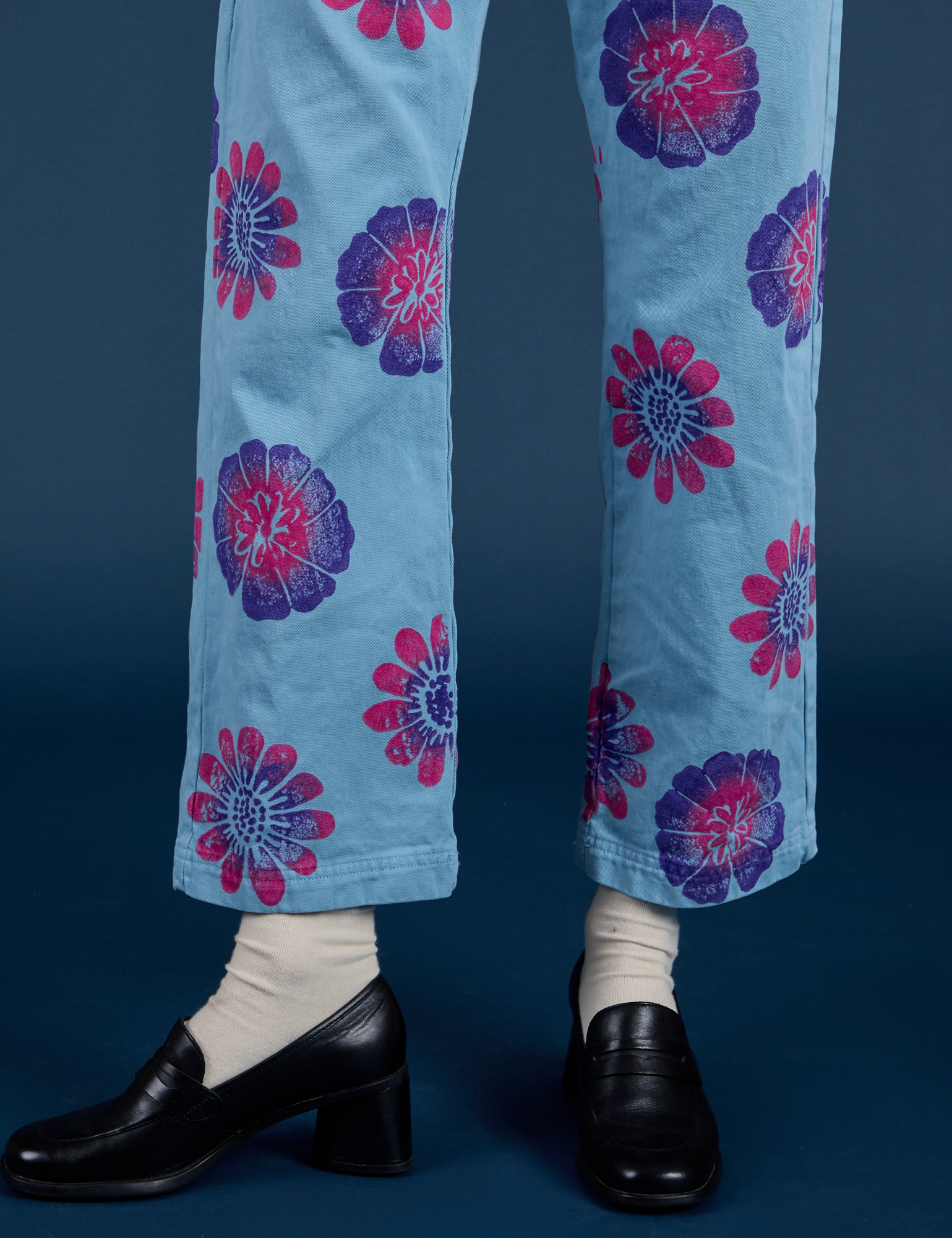 Floral Painted Work Pants in Blue pant leg close up on Madeline