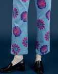 Floral Painted Work Pants in Blue pant leg close up on Madeline
