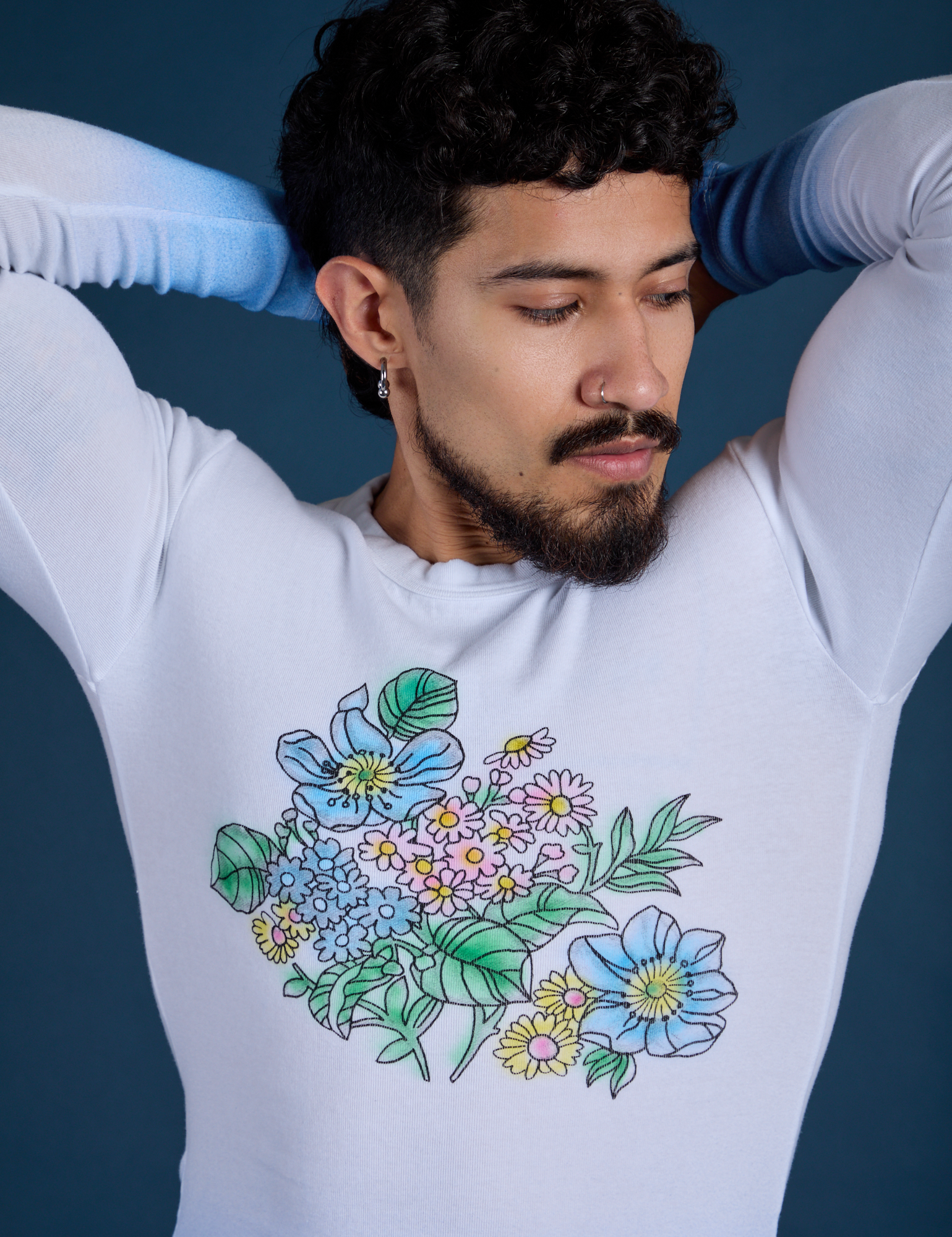 Front close up of Floral Long Sleeve Baby Tee in Baby Blue on Jesse