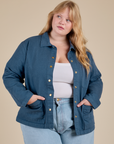 Juliet is 5'8" and wearing L Denim Work Jacket in French Blue
