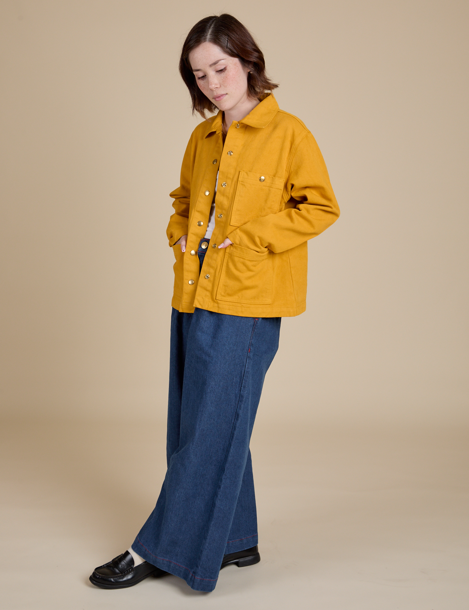 Denim Work Jacket in Mustard Yellow and dark wash Indigo Wide Leg Trousers on Hana