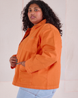 Denim Work Jacket in Construction Orange side view on Morgan