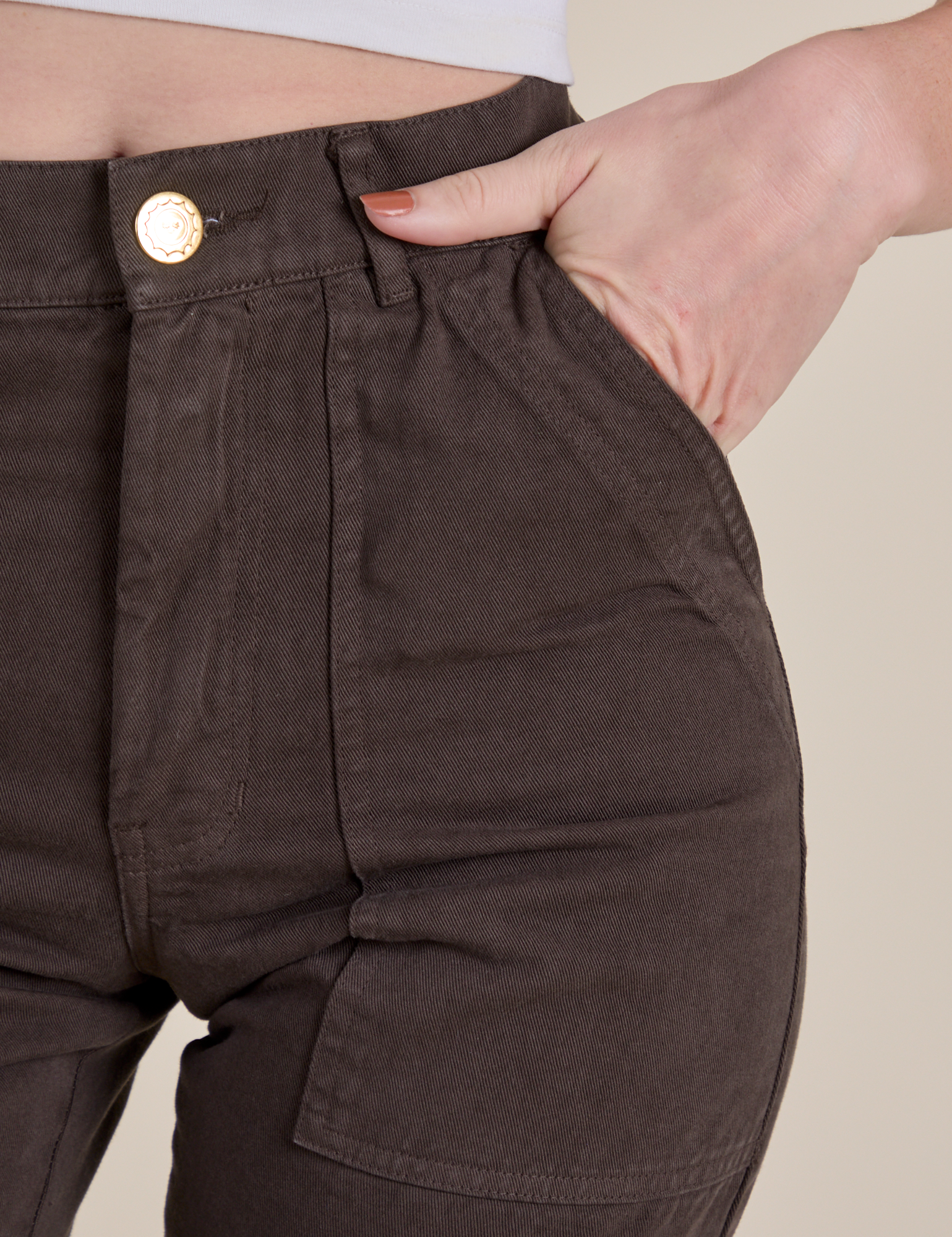 Close up of Alex's hand in the back pocket of Work Pants in Espresso Brown
