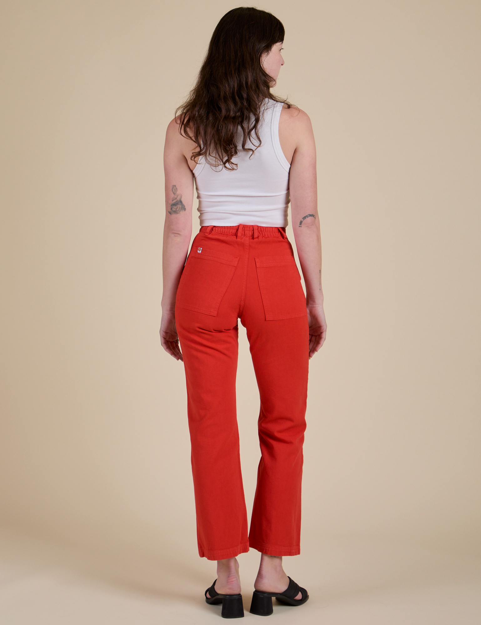 Back view of Work Pants in Mustang Red on Alex